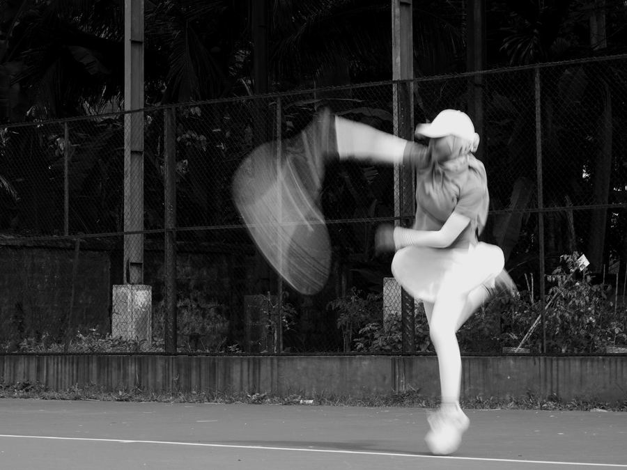 Tennis player serving